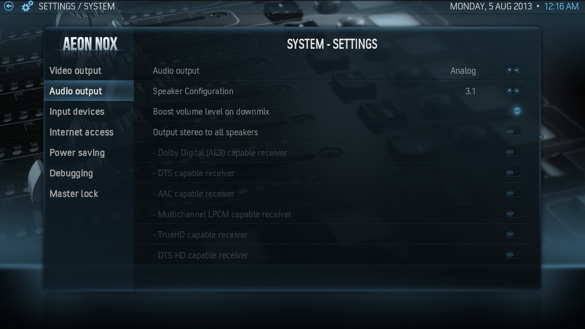System Settings -> Audio Output (note: although analog works fine you will only get 2.0 (stereo) regardless of speaker configuration, try HDMI if you need more than 2.0)